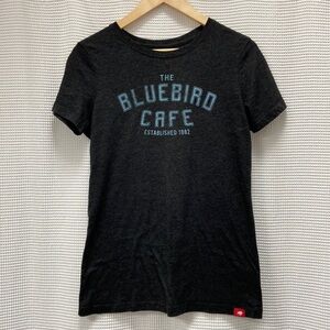 Women’s Sportige Apparel Co. “The Blue Bird Cafe” Short Sleeve T-Shirt. Size L.